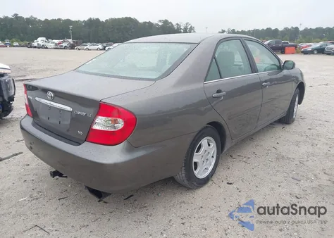 2003 Toyota Camry Le V6 z USA, uszkodzony, nr VIN 4T1BF32K73U547475
